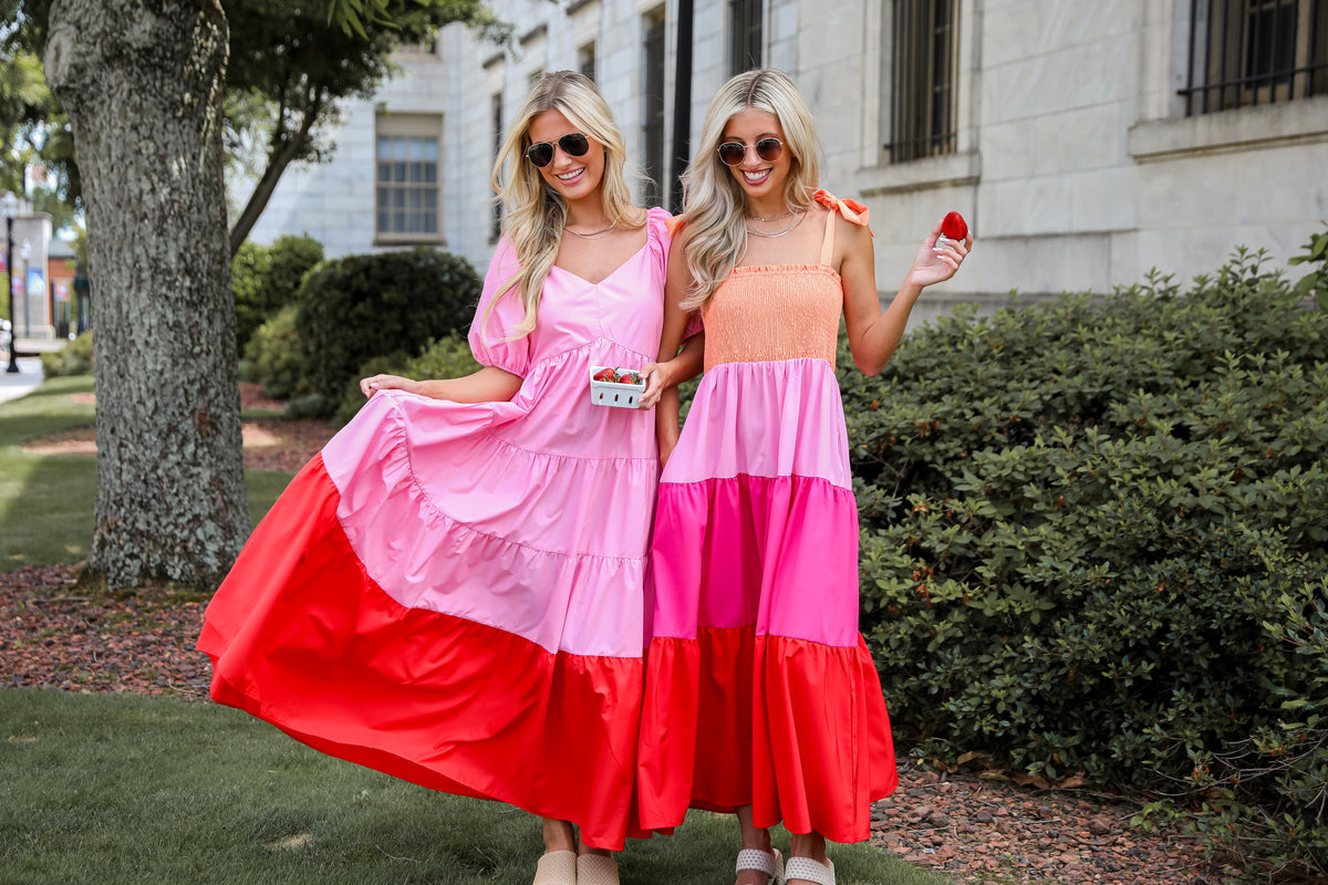 models wearing pink maxi dresses