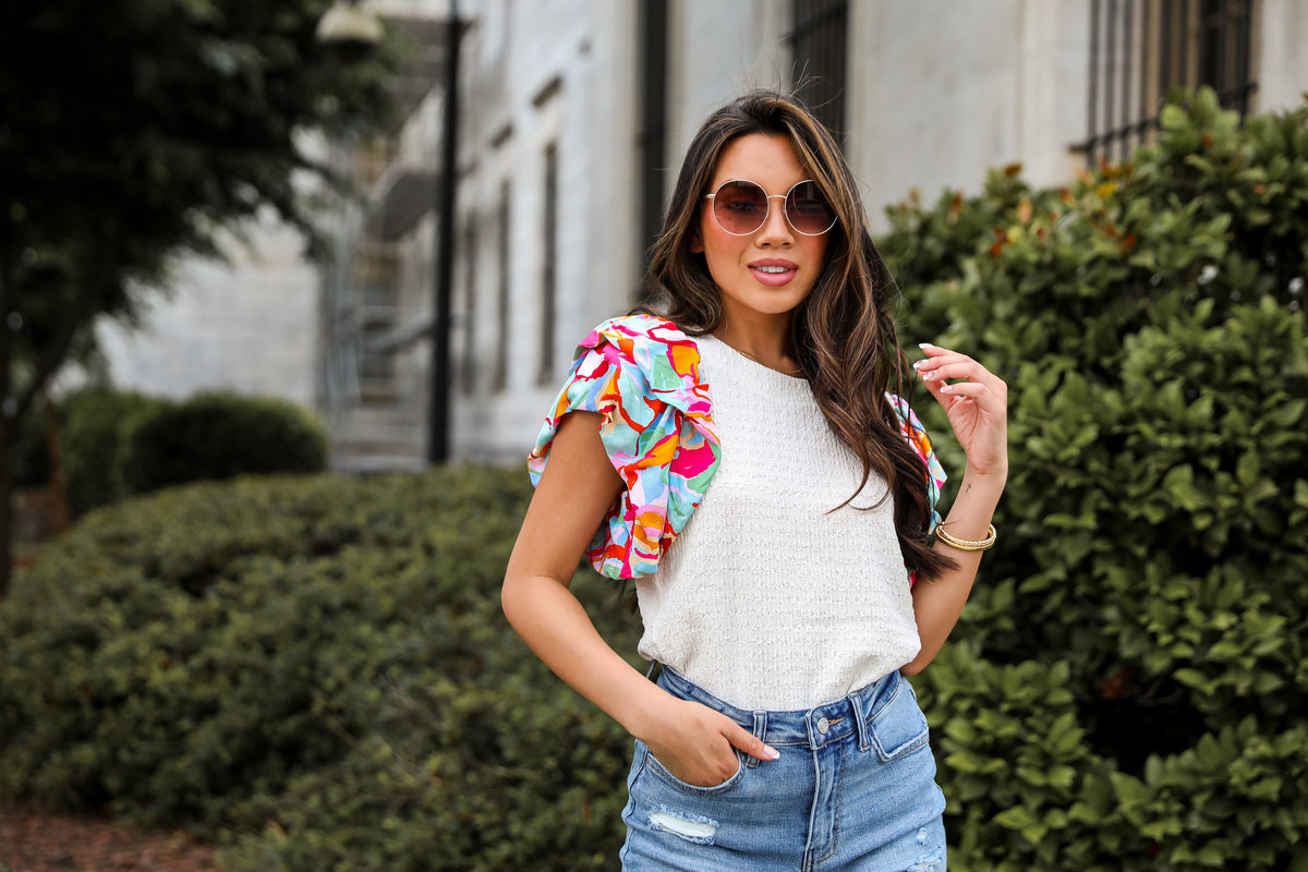model wearing a cute blouse