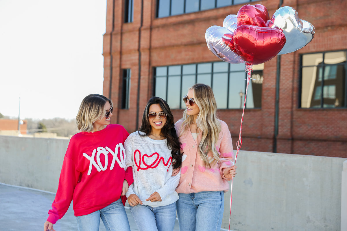 models wearing cute valentine's day sweaters
