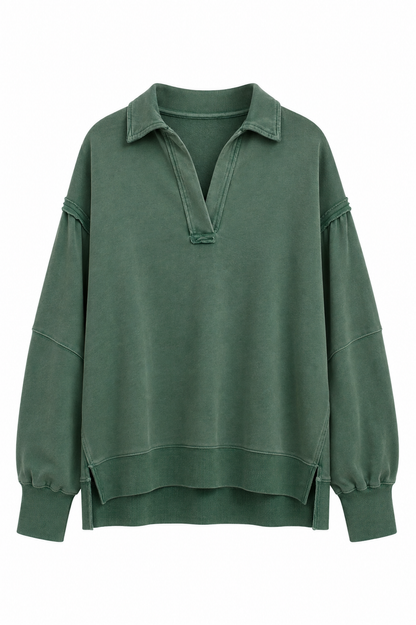 A dark green long-sleeve sweatshirt with a half-placket collar and decorative stitching on the shoulders and sleeves, shown against a plain white background.