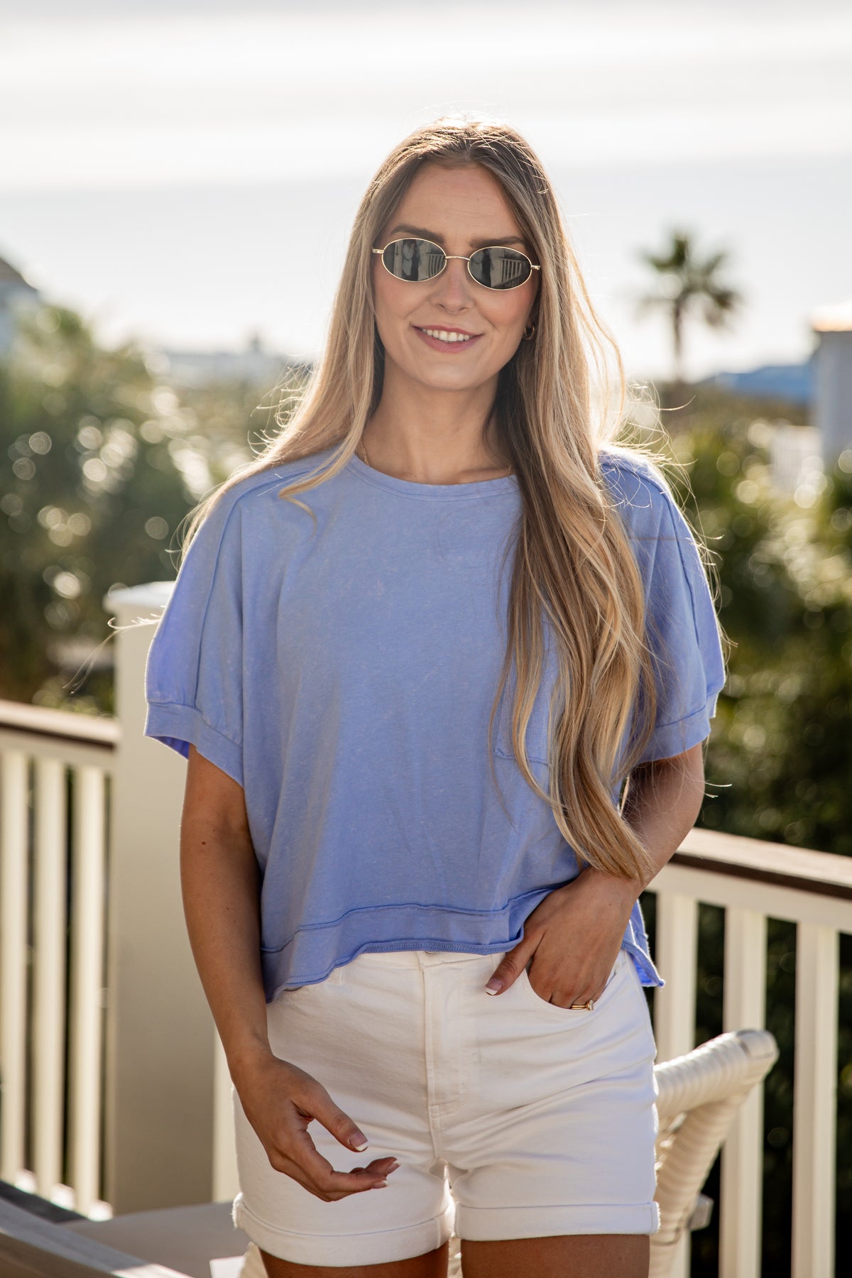 woman wearing a front pocket relaxed shirt 