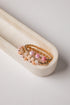 Set of beaded bracelets on a white surface