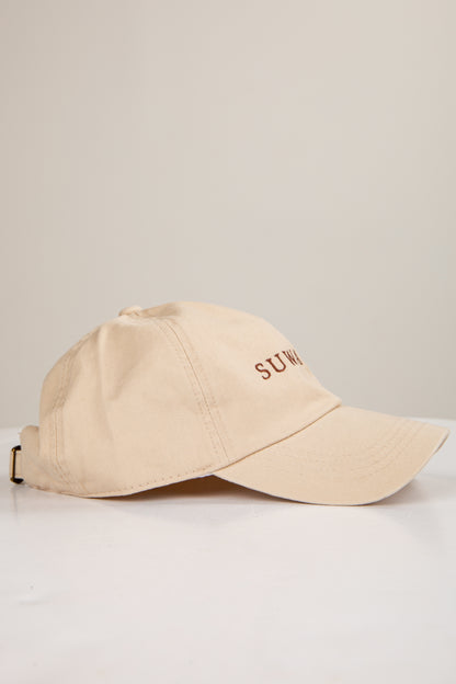 Beige cap with &