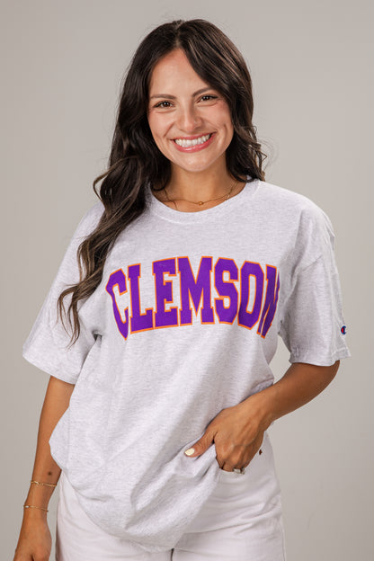 Woman wearing a Clemson t-shirt against a plain background