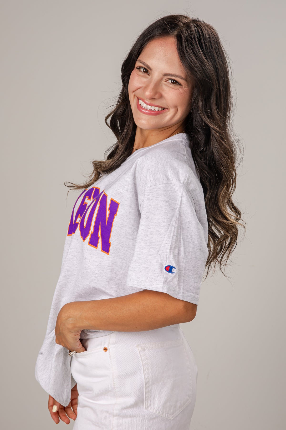 Woman wearing a Clemson t-shirt against a plain background