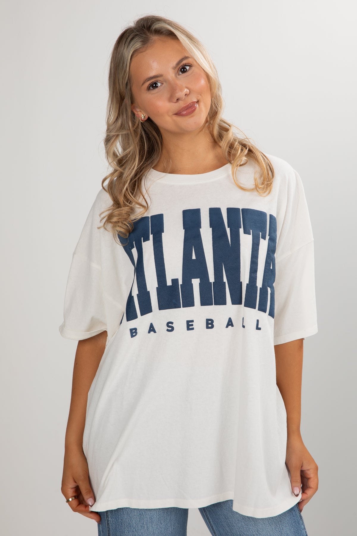 Woman wearing a white t-shirt with &