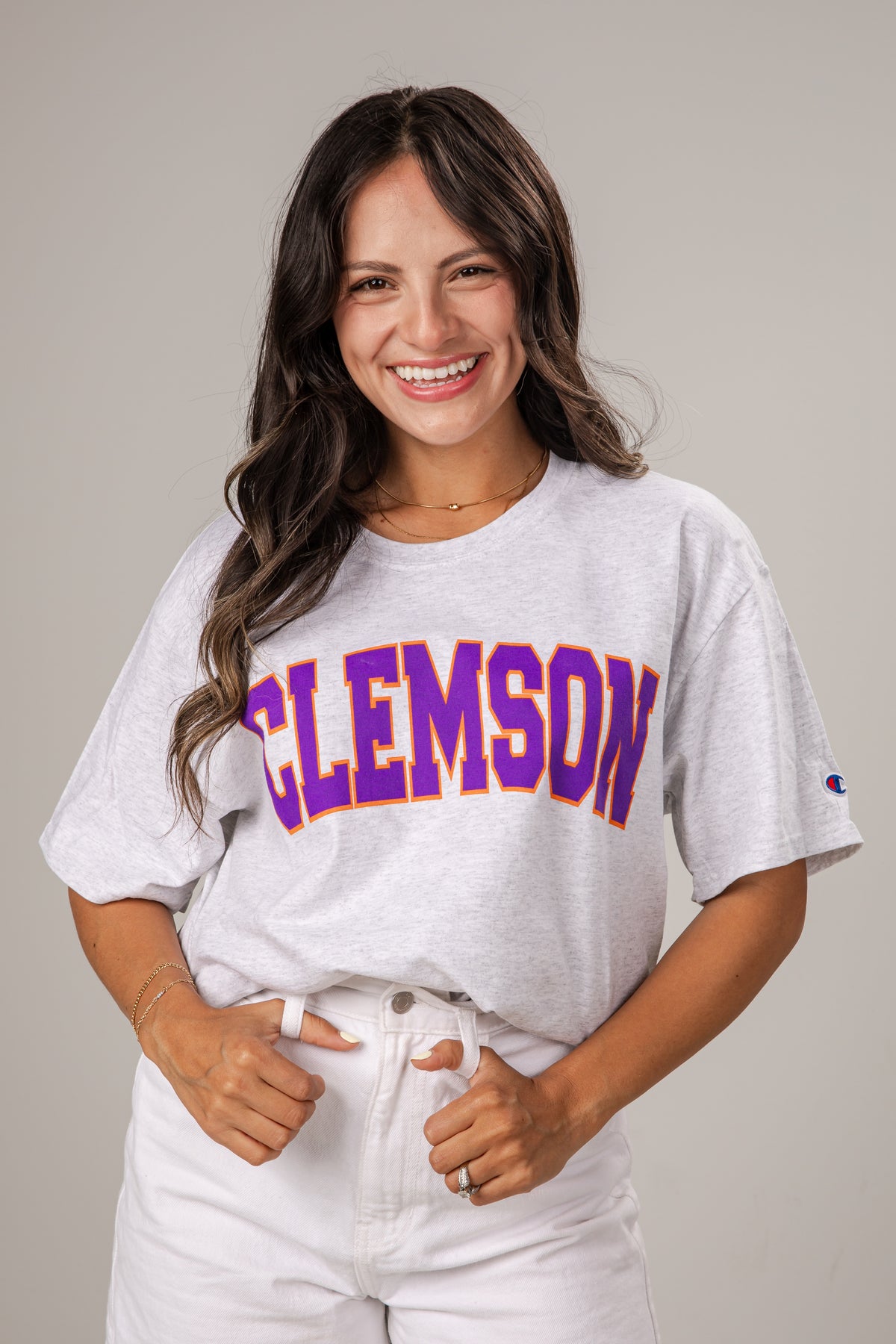 Woman wearing a Clemson t-shirt against a plain background