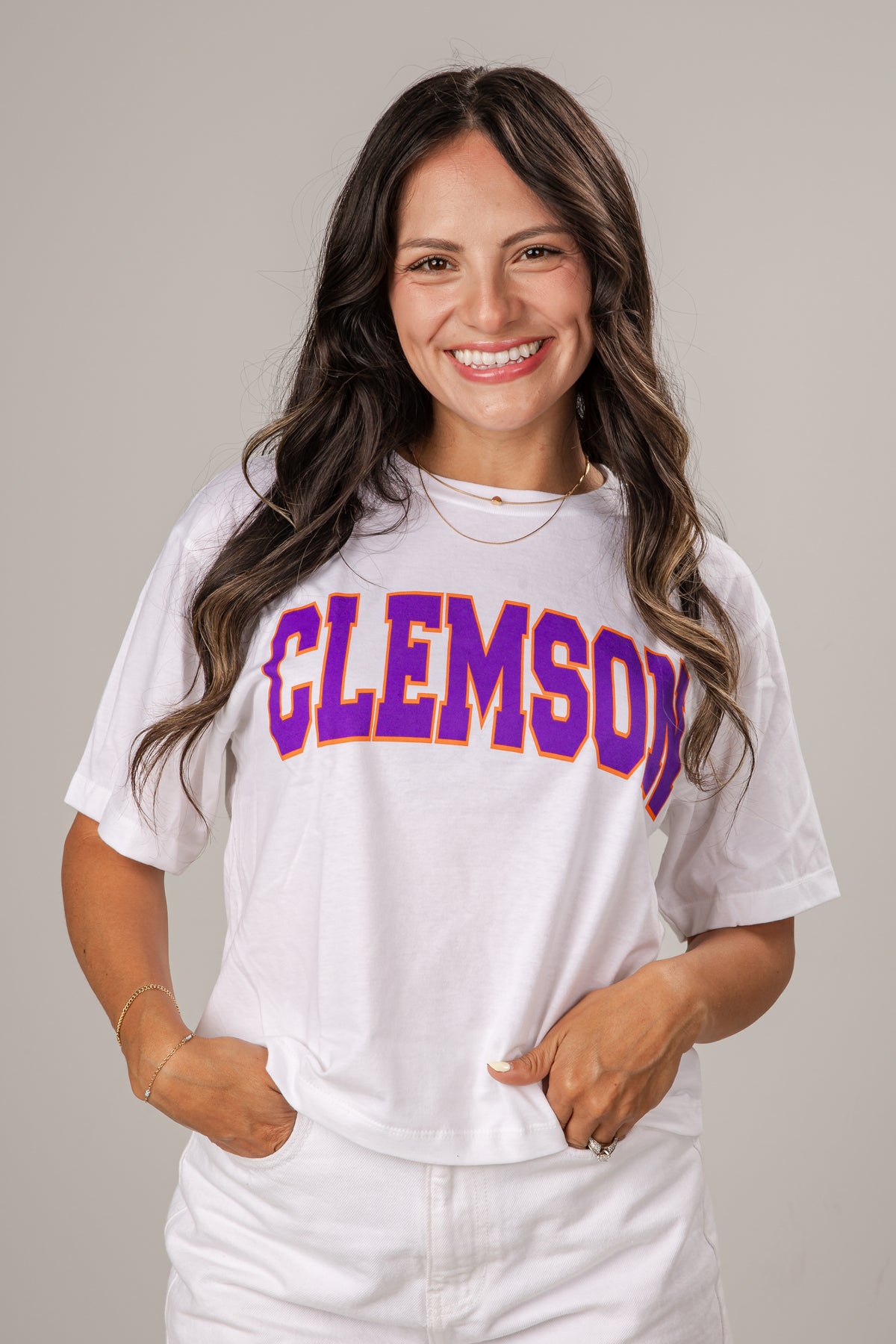 Woman wearing a white t-shirt with &