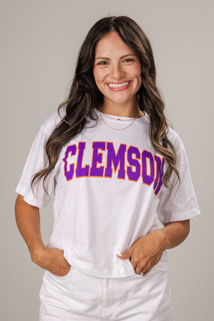 Woman wearing a white t-shirt with &