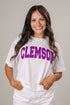 Woman wearing a white t-shirt with &