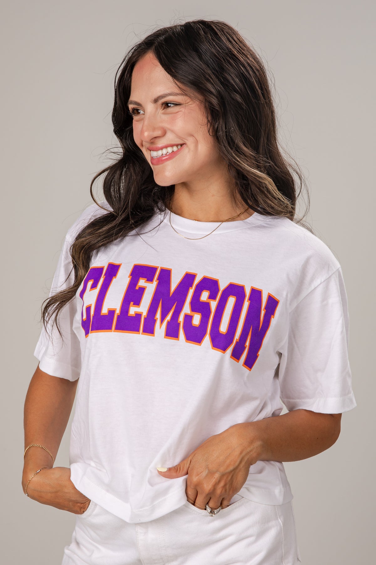 Woman wearing a white t-shirt with &