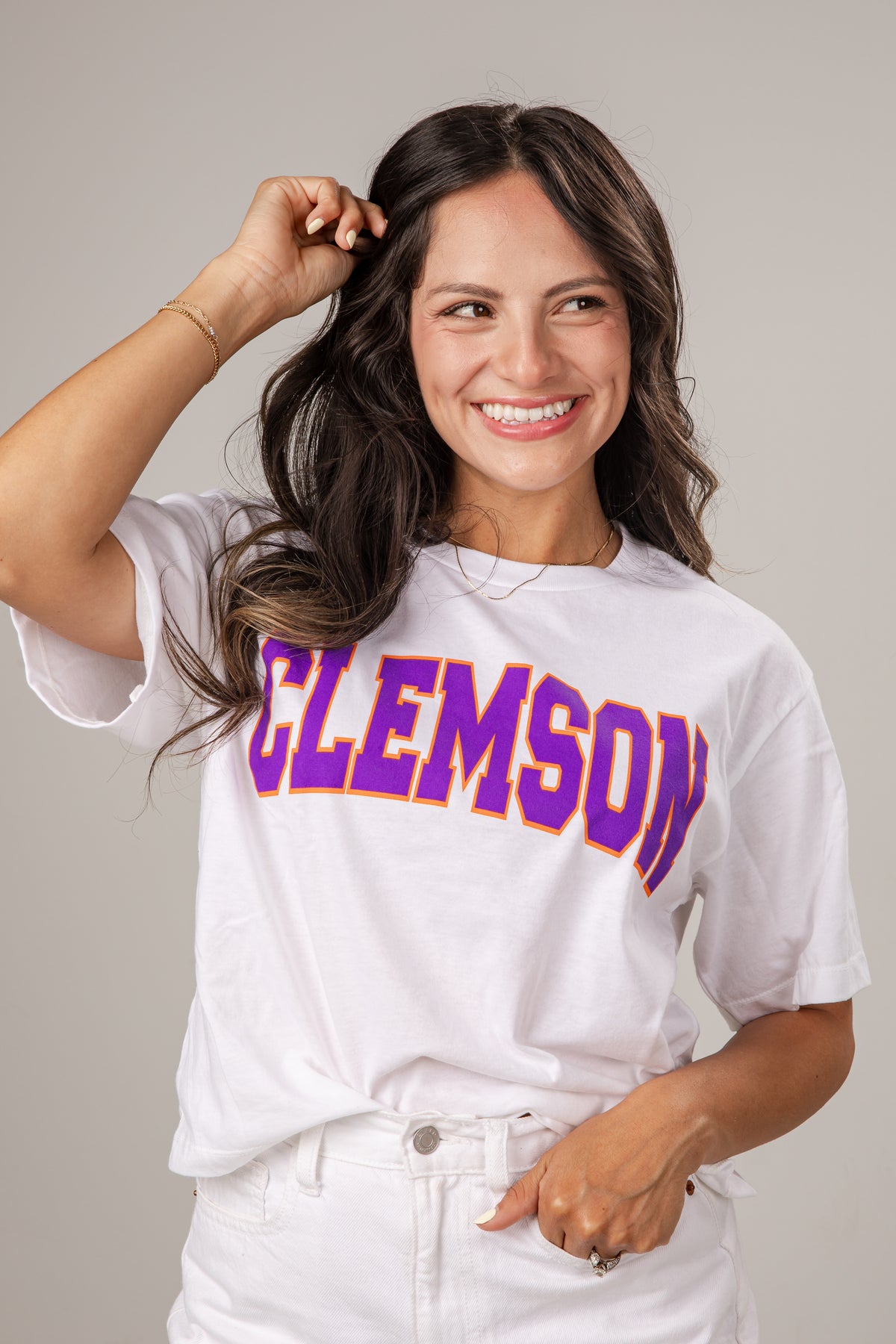 Woman wearing a white t-shirt with &