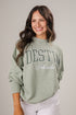 Woman wearing a green &