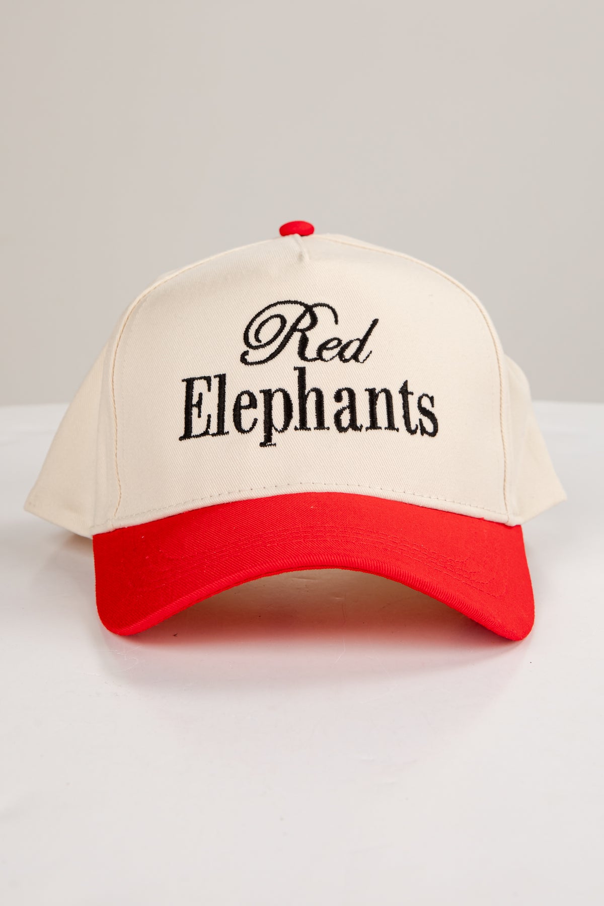 Cap with &