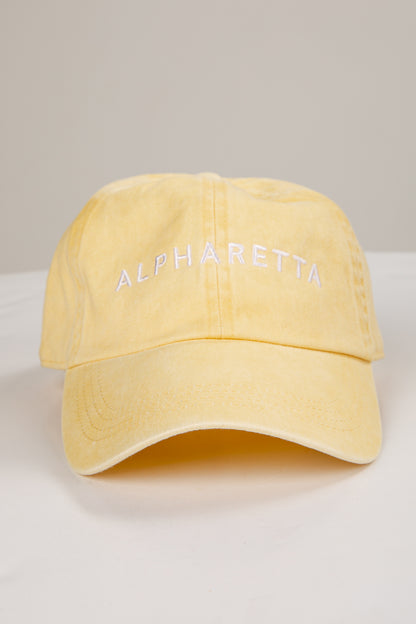 Yellow cap with &