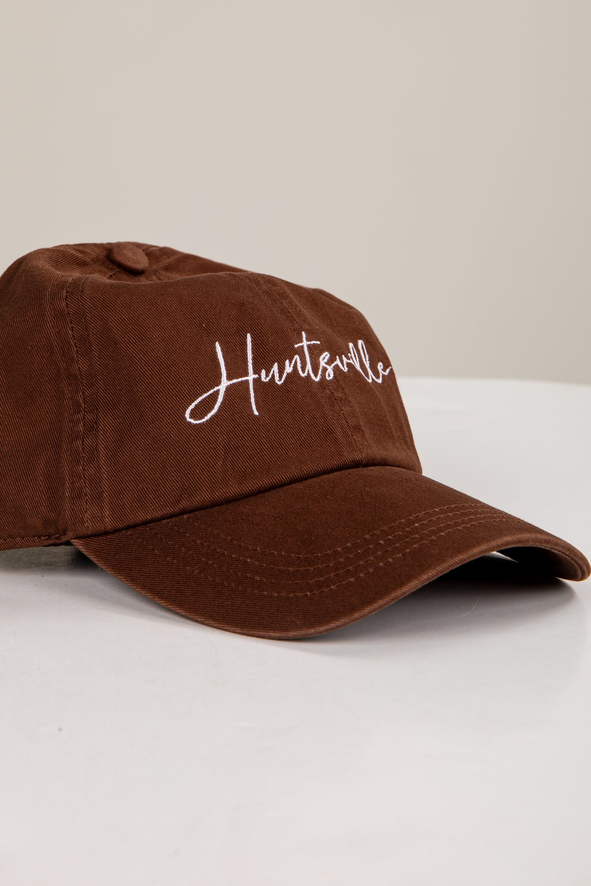 Brown cap with &