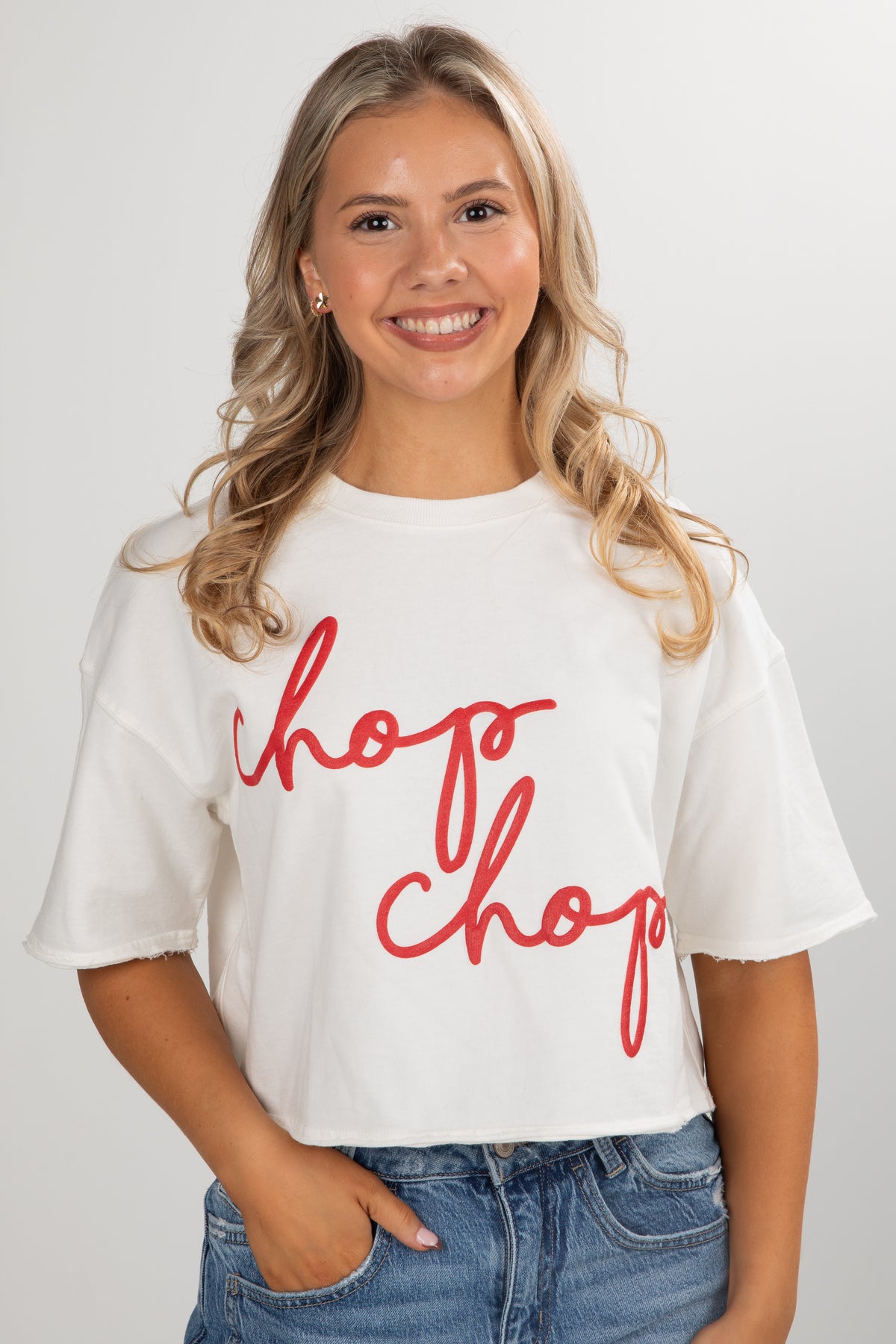 Woman wearing a white t-shirt with &