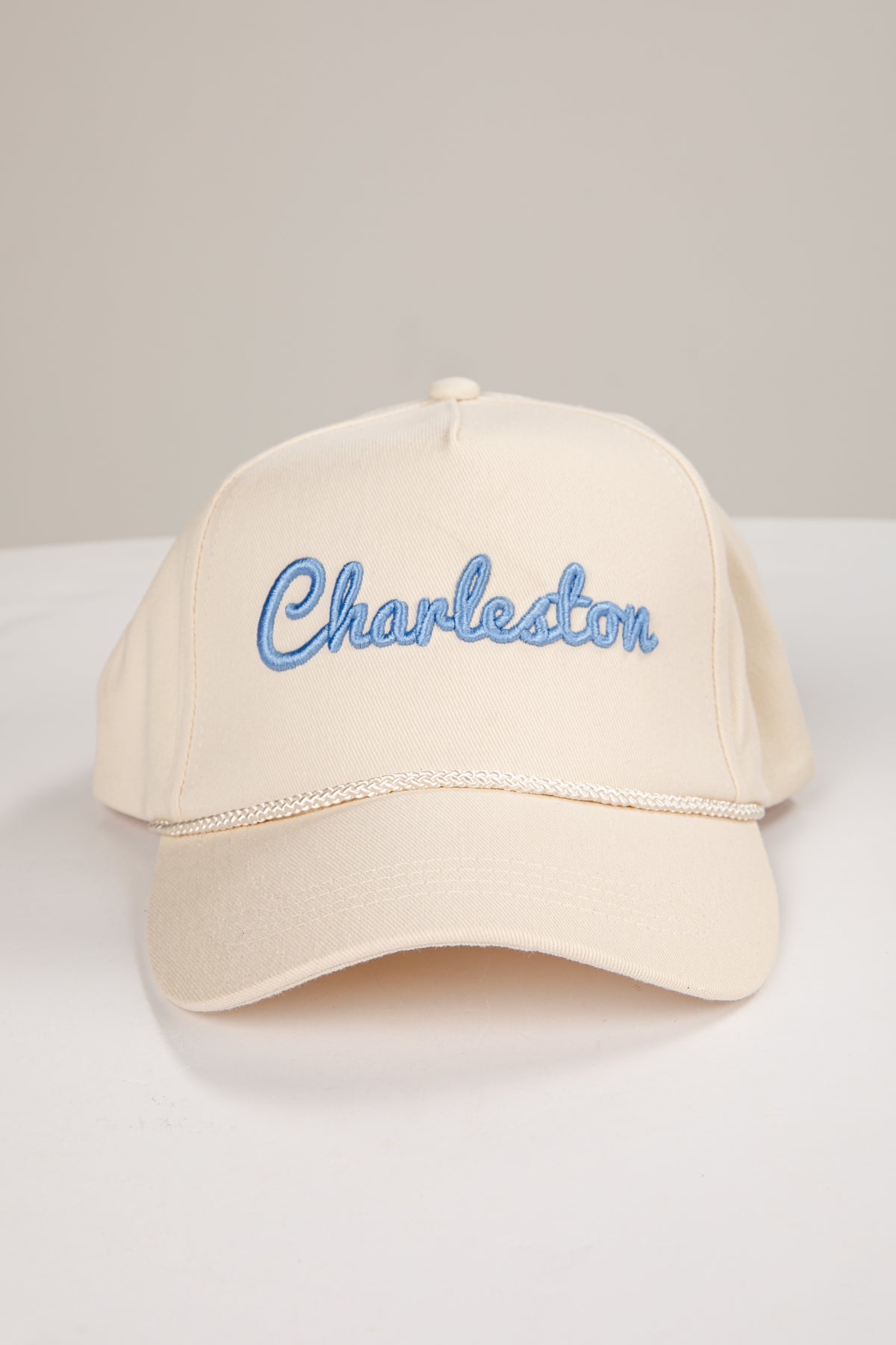 Beige cap with &