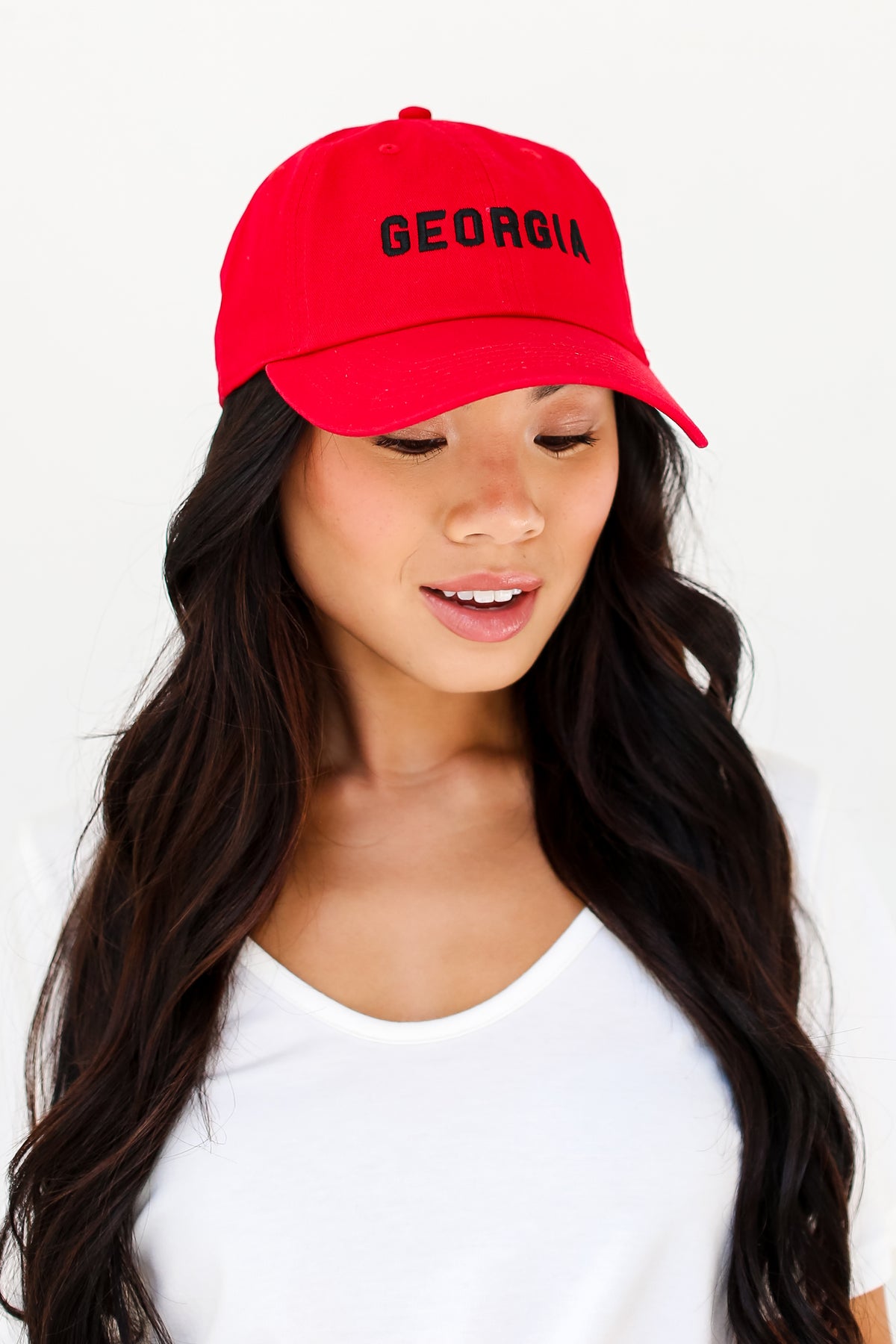 red Georgia Embroidered Hat on dress up model